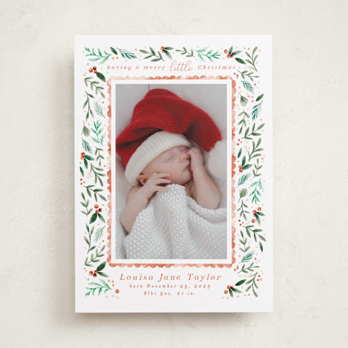 This is a tangerine babys first christmas with standard by Alethea and Ruth called merry little christmas greenery printing on recycled smooth signature in standard