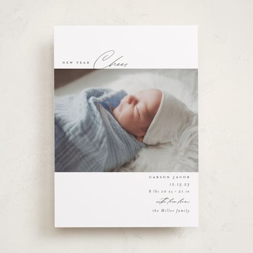This is a fir babys first christmas with standard by Emily Betts called bundle printing on recycled smooth signature in standard