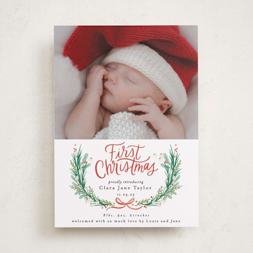This is a berry babys first christmas with standard by Alethea and Ruth called first christmas wreath printing on recycled smooth signature in standard