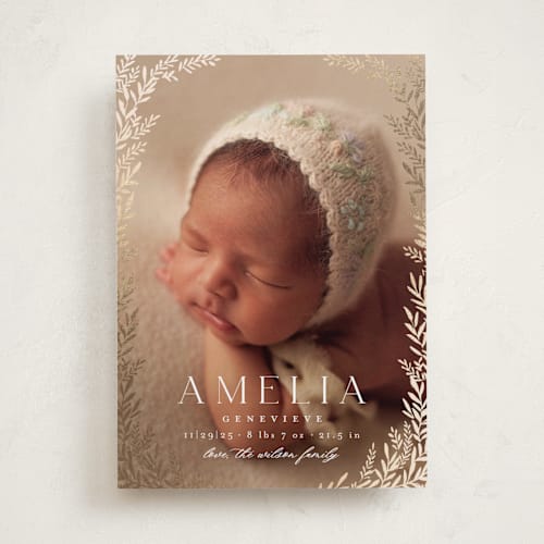 This is a vanilla foil stamped birth announcements with foil pressed by Laura Hankins called botanica frame printing on smooth signature in standard