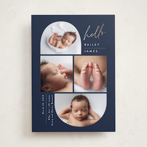 This is a navy foil stamped birth announcements with foil pressed by Carolyn MacLaren called so current printing on smooth signature in standard