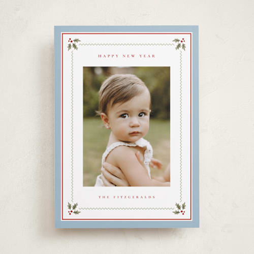 This is a powder blue photo christmas cards with standard by Wildfield Paper Co called holly berry border printing on recycled smooth signature in standard