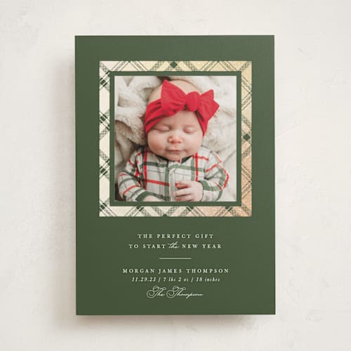 This is a olive babys first christmas with foil pressed by Robert and Stella called every good gift printing on recycled smooth signature in standard