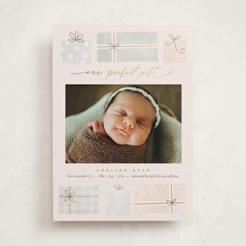 This is a petal babys first christmas with foil pressed by Pixel and Hank called our perfect gift printing on recycled smooth signature in standard