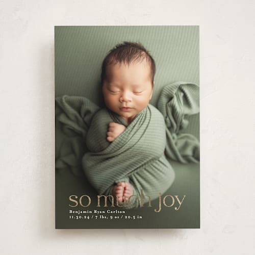 This is a snowfall babys first christmas with foil pressed by Mary Kay Garttmeier called baby joy printing on recycled smooth signature in standard
