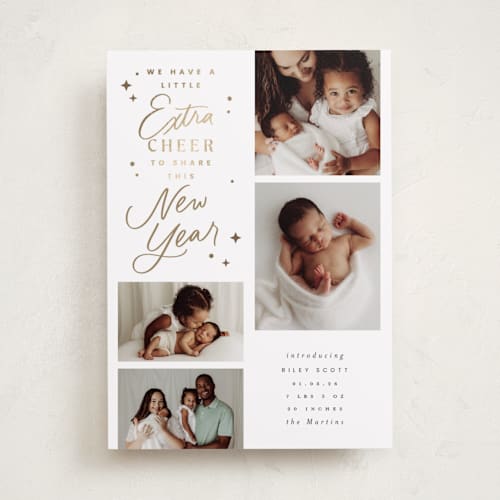 This is a snowfall babys first christmas with foil pressed by Everett Paper Goods called extra cheerful printing on recycled smooth signature in standard