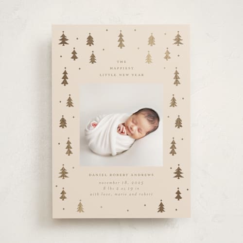 This is a candlelight babys first christmas with foil pressed by Jennifer Holbrook called merry little trees printing on recycled smooth signature in standard