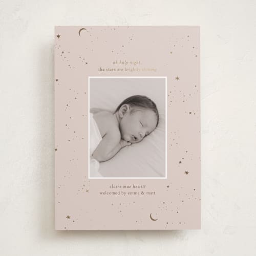 This is a mauve babys first christmas with foil pressed by Ellen Schlegelmilch called the stars printing on recycled smooth signature in standard