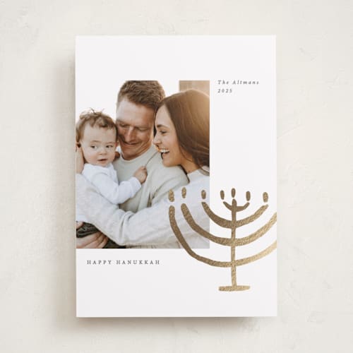 This is a gilded hanukkah cards with foil pressed by Sumak Studio called golden menorah printing on recycled smooth signature in standard