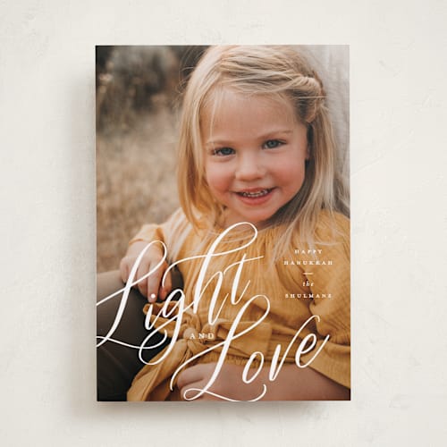 This is a snow hanukkah cards with standard by Ashley Rosenbaum called light & love printing on recycled smooth signature in standard