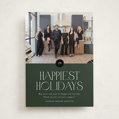 This is a wreath business holiday cards with standard by Stephanie Hawkes called happiest holidays printing on recycled smooth signature in standard