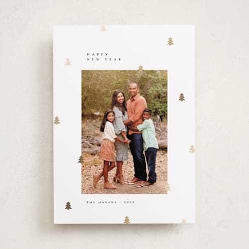 This is a cotton foil pressed holiday cards with foil pressed by Michelle Taylor called scattered trees printing on recycled smooth signature in standard