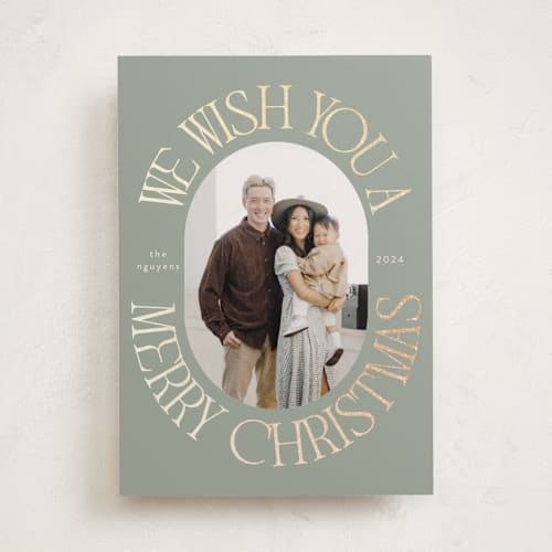 This is a seaglass foil pressed holiday cards with foil pressed by Morgan Kendall called merry wish printing on recycled smooth signature in standard