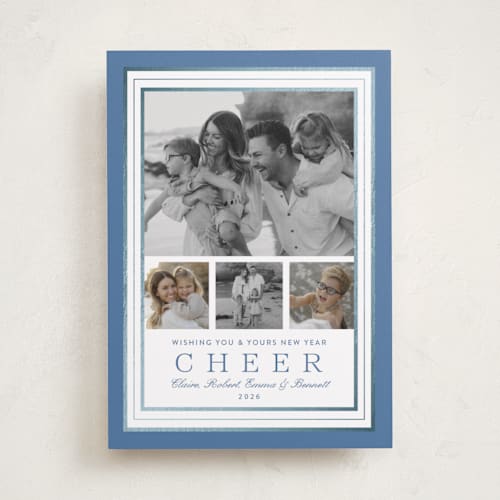 This is a wintermint foil pressed holiday cards with foil pressed by Alston Foster called favorite joys printing on recycled smooth signature in standard