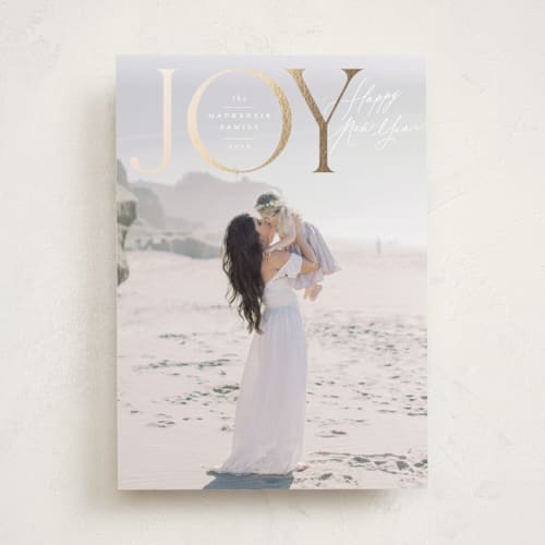 This is a mist foil pressed holiday cards with foil pressed by Wildfield Paper Co called joy to all the world printing on recycled smooth signature in standard
