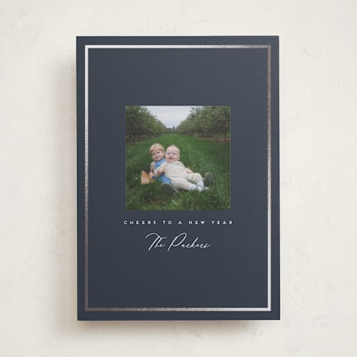 This is a blue jay foil pressed holiday cards with foil pressed by Angela Garrick called petit printing on recycled smooth signature in standard