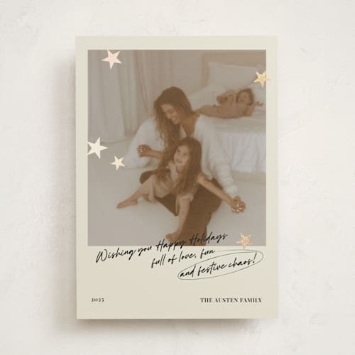 This is a buttercream foil pressed holiday cards with foil pressed by Helena Vitto called messy christmas printing on recycled smooth signature in standard