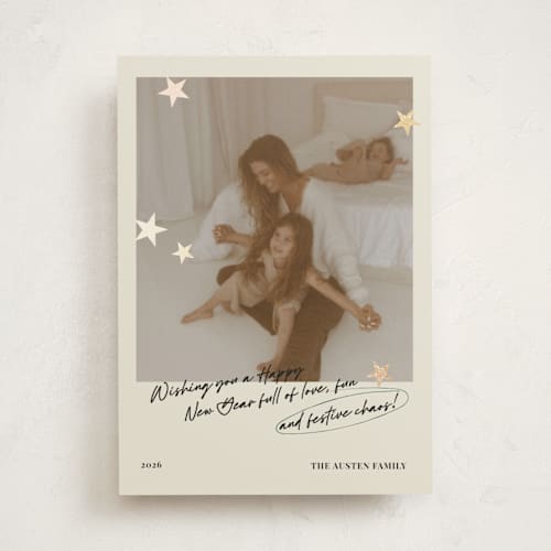 This is a buttercream foil pressed holiday cards with foil pressed by Helena Vitto called messy christmas printing on recycled smooth signature in standard