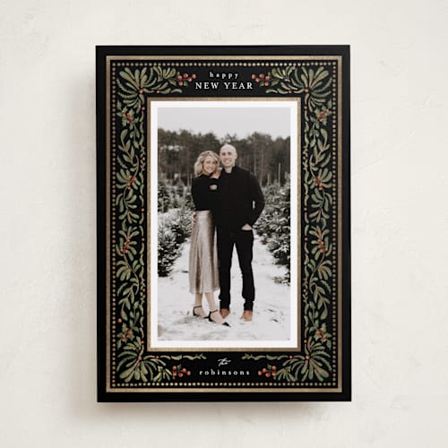 This is a ebony foil pressed holiday cards with foil pressed by Chris Griffith called special occasion printing on recycled smooth signature in standard