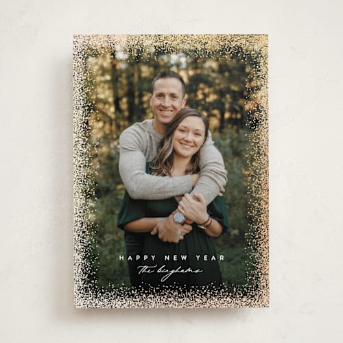 This is a snowfall foil pressed holiday cards with foil pressed by Jessica Williams called magical printing on recycled smooth signature in standard