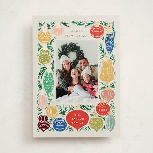 This is a sand foil pressed holiday cards with foil pressed by Alethea and Ruth called ornament tree frame printing on recycled smooth signature in standard