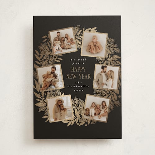 This is a coal foil pressed holiday cards with foil pressed by Leah Bisch called wreath printing on recycled smooth signature in standard