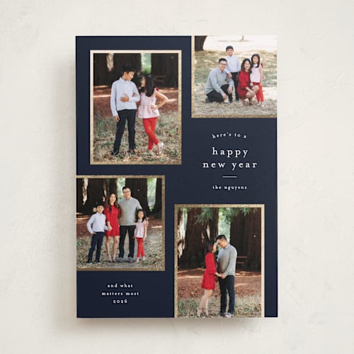 This is a navy foil pressed holiday cards with foil pressed by Stacey Meacham called simply framed printing on recycled smooth signature in standard