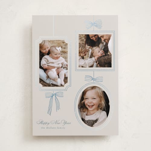 This is a champagne foil pressed holiday cards with foil pressed by Baumbirdy called bows printing on recycled smooth signature in standard