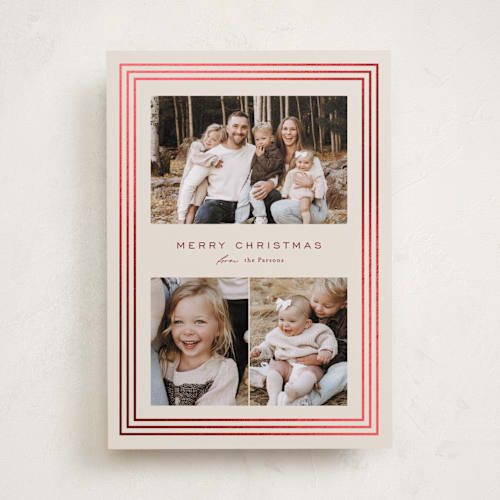 This is a cranberry foil pressed holiday cards with foil pressed by Kate Ahn called peppermint stripe printing on recycled smooth signature in standard