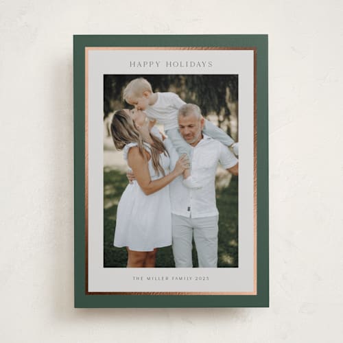 This is a evergreen foil pressed holiday cards with foil pressed by Nicole Walsh called foil frame printing on recycled smooth signature in standard