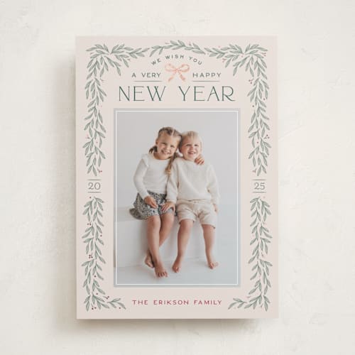 This is a ecru foil pressed holiday cards with foil pressed by Hooray Creative called christmas garland printing on recycled smooth signature in standard