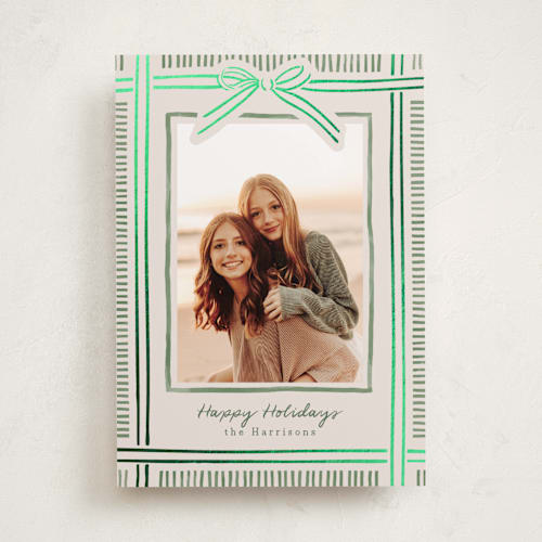 This is a moss foil pressed holiday cards with foil pressed by Chris Griffith called holiday wrap printing on recycled smooth signature in standard
