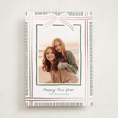 This is a pink sand foil pressed holiday cards with foil pressed by Chris Griffith called holiday wrap printing on recycled smooth signature in standard