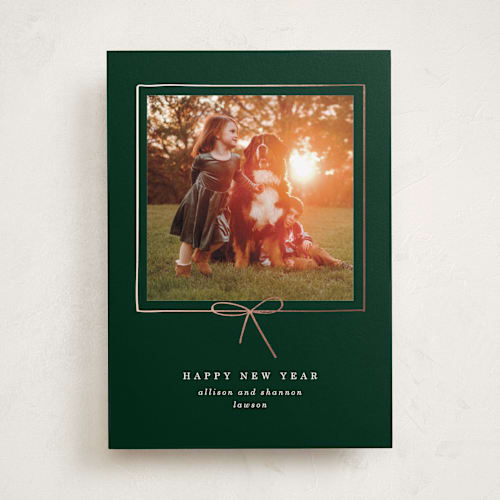 This is a evergreen foil pressed holiday cards with foil pressed by Baumbirdy called little bow printing on recycled smooth signature in standard