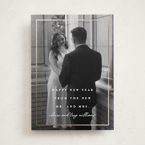 This is a snow foil pressed holiday cards with foil pressed by Vanessa Doyle called new mr. & mrs. printing on recycled smooth signature in standard