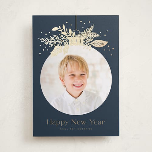 This is a night foil pressed holiday cards with foil pressed by Erin German called ornament greenery printing on recycled smooth signature in standard
