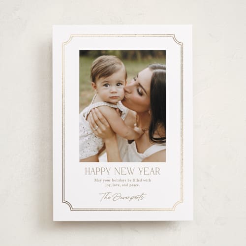 This is a snow foil pressed holiday cards with foil pressed by Yaling Hou Suzuki called holiday elegance printing on recycled smooth signature in standard