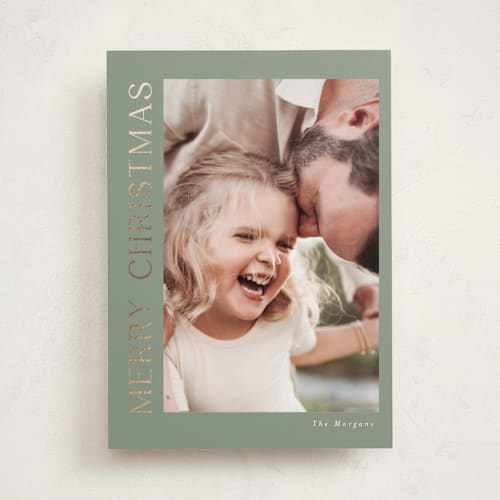 This is a sage foil pressed holiday cards with foil pressed by Angela Thompson called gilded merry printing on recycled smooth signature in standard