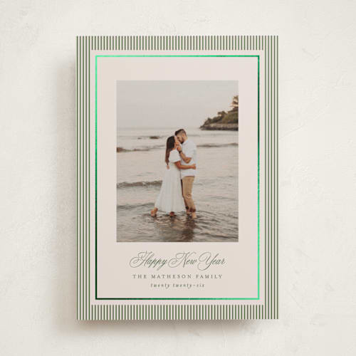 This is a cedar foil pressed holiday cards with foil pressed by Kelly Schmidt called striped elegance printing on recycled smooth signature in standard