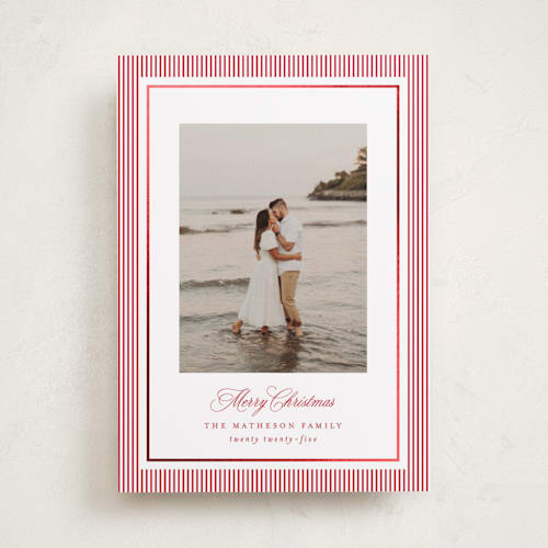 This is a berry foil pressed holiday cards with foil pressed by Kelly Schmidt called striped elegance printing on recycled smooth signature in standard