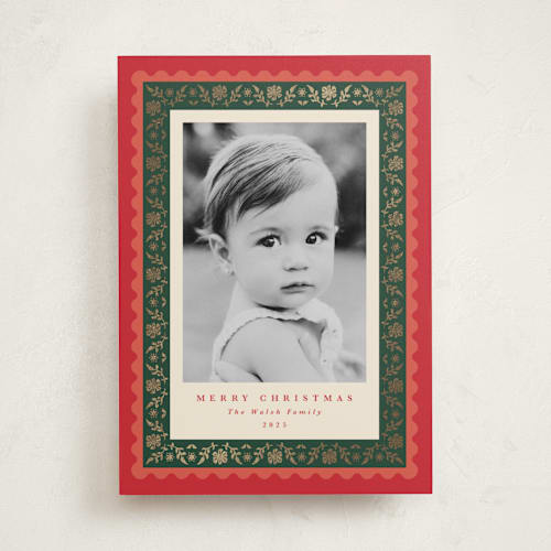 This is a holly berry foil pressed holiday cards with foil pressed by Olivia Raufman called folkloric printing on recycled smooth signature in standard