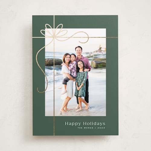 This is a emerald foil pressed holiday cards with foil pressed by Michelle Taylor called gilded ribbon printing on recycled smooth signature in standard