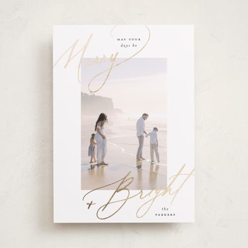 This is a snow foil pressed holiday cards with foil pressed by Carolyn Nicks called bright+merry printing on recycled smooth signature in standard