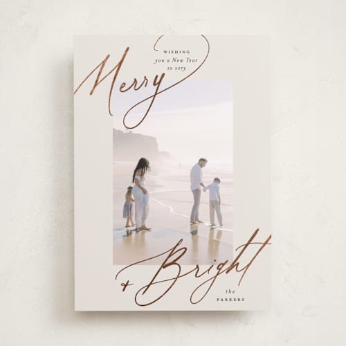 This is a sweet cream foil pressed holiday cards with foil pressed by Carolyn Nicks called bright+merry printing on recycled smooth signature in standard