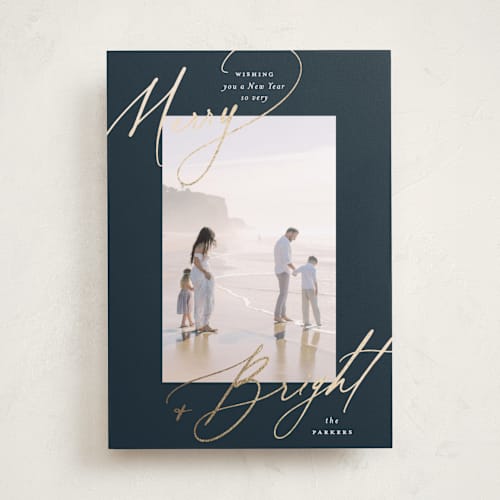 This is a night foil pressed holiday cards with foil pressed by Carolyn Nicks called bright+merry printing on recycled smooth signature in standard