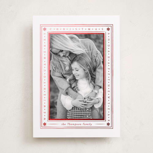 This is a snow foil pressed holiday cards with foil pressed by Robert and Stella called tiny type border printing on recycled smooth signature in standard