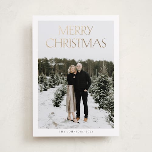 This is a cloud foil pressed holiday cards with foil pressed by Nicole Walsh called merry & classic printing on recycled smooth signature in standard