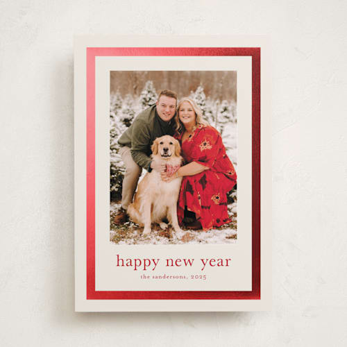 This is a ivory foil pressed holiday cards with foil pressed by Stacey Meacham called modern frame printing on recycled smooth signature in standard