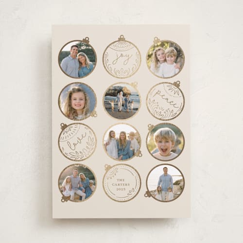 This is a clay foil pressed holiday cards with foil pressed by Teju Reval called gilded ornaments printing on recycled smooth signature in standard