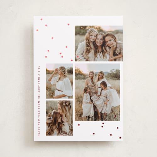 This is a poinsettia foil pressed holiday cards with foil pressed by Sumak Studio called tiny stars confetti printing on recycled smooth signature in standard